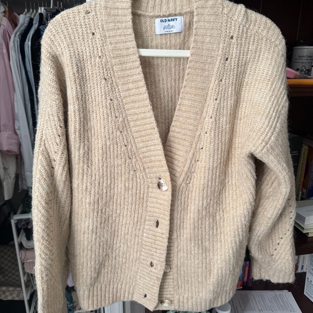 Knit cardigan in creme color in size M